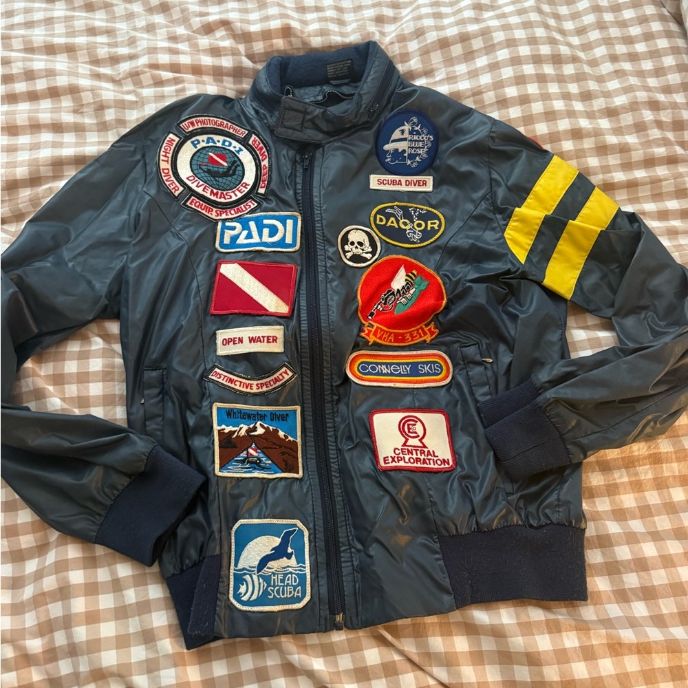 Vintage lightweight diver jacket with patches.